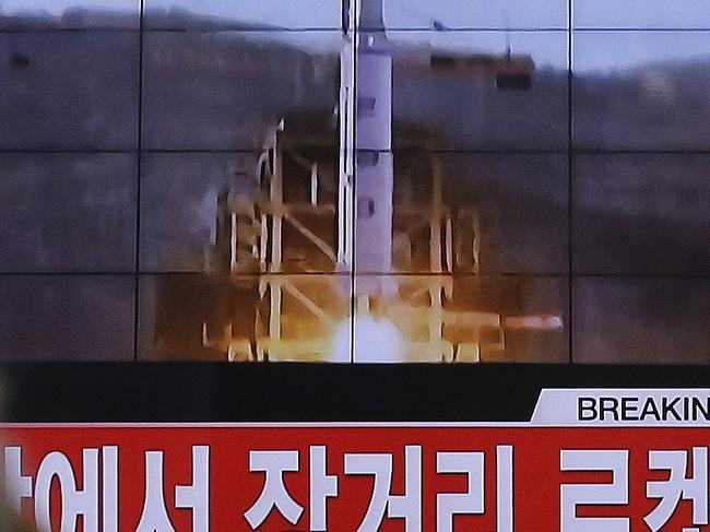 FILE - In this Feb. 7, 2016, photo, a South Korean man watches a TV news program with a file footage about North Korea's rocket launch at Seoul Railway Station in Seoul, South Korea. North Korean nuclear and rocket tests are drawing quick responses from the U.S. that will upset a supposed partner against Pyongyang's weapons development _ China. New efforts to toughen missile defense in South Korea and sanctions legislation moving swiftly through Congress could both hurt Chinese interests. The Chinese are concerned the missile defense system could be used against them, and the U.S. sanctions could hit Chinese companies that trade with North Korea. (AP Photo/Ahn Young-joon)