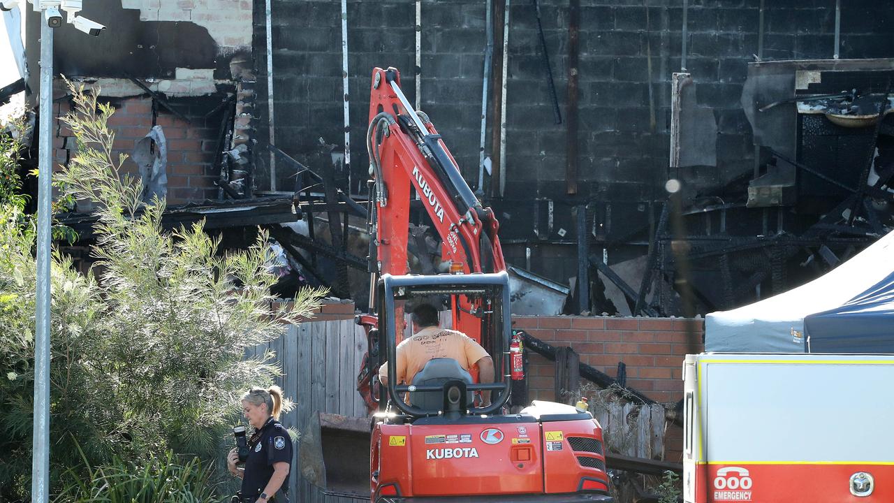 An excavator was brought in to go through the rubble. Picture: Liam Kidston