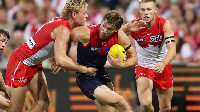 Jack Viney is swamped by Isaac Heeney. Picture: Cameron Spencer/Getty Images