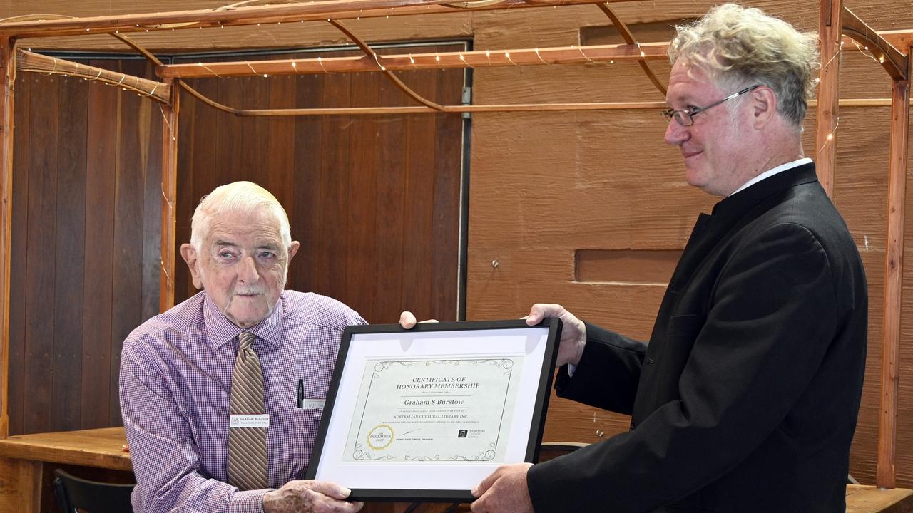 Toowoomba photographer, Graham Burstow (left) was presented with an honorary lifetime membership from the Australian Cultural Library's Steve Townsend.