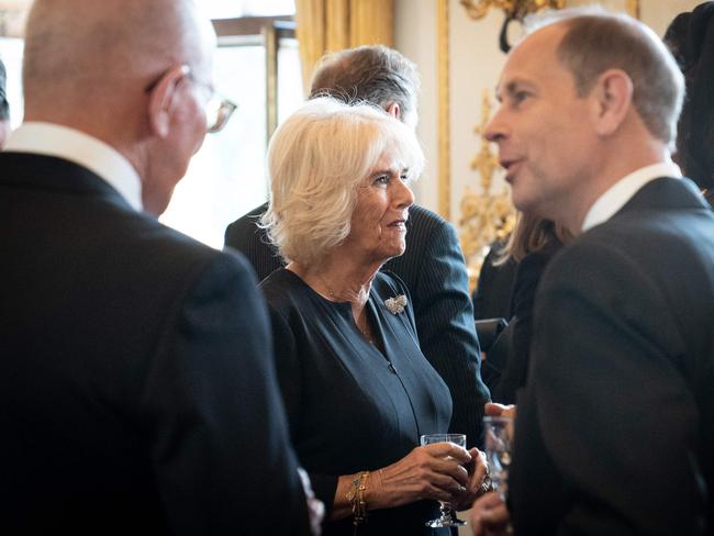 Camilla, Queen Consort, and Prince Edward speak to guests during a lunch, including Australia’s Governor-general David Hurley.