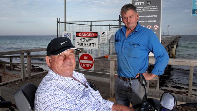 Paul and Noel Cave at the Tumby Bay jetty. Picture Dean Martin