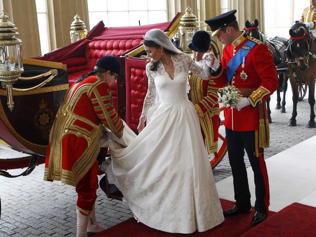 The Duke and Duchess of Cambridge arrive at Buckingham Palace on a 1902 State Landau carriage after their wedding in London on April 29, 2011. Picture: AFP/WPA Pool/Andrew Winning