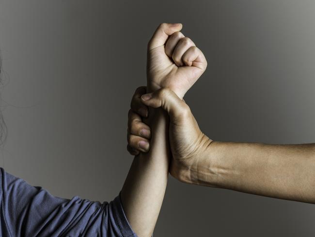 istock generic:  woman, abuse, DV, domestic violence, harassment, sexual harassment.   Parent is holding her little girls arm and is about to use violence. Representing child abuse and domestic violence. . Picture: istock