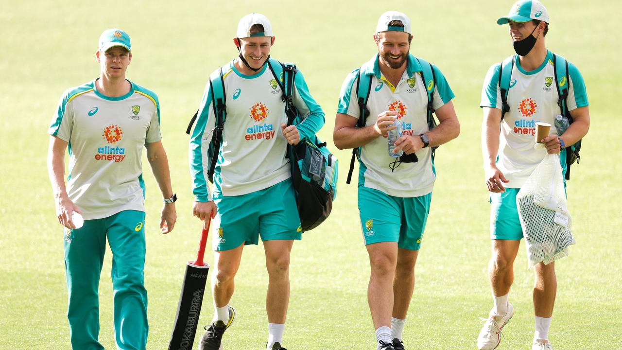 Steve Smith (left) wasn’t smiling after tweaking his back during his training. Picture: Daniel Kalisz/Getty Images