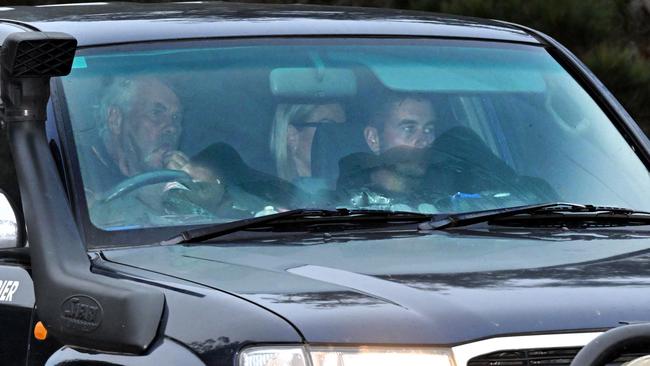 Family members arrive at a rural property in Bungonia in the NSW Southern Tablelands, 170km southwest of Sydney, on Tuesday. Picture: AAP