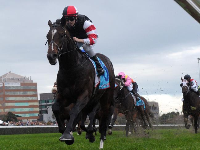 MELBOURNE, AUSTRALIA - MAY 17: Kayla Nisbet riding Lord of the Sky wins Race 6, the Taralye Listen Learn Speak Plate during Melbourne Racing at Caulfield Racecourse on May 17, 2014 in Melbourne, Australia. (Photo by Vince Caligiuri/Getty Images)