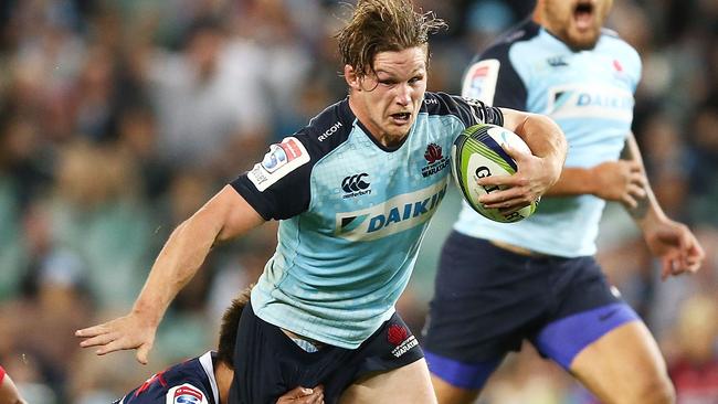 SYDNEY, AUSTRALIA - MAY 21:  Michael Hooper of the Waratahs is tackled during the round 13 Super Rugby match between the Waratahs and the Rebels at Allianz Stadium on May 21, 2017 in Sydney, Australia.  (Photo by Mark Metcalfe/Getty Images)