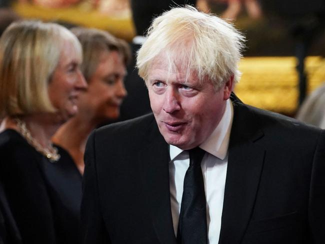 Former prime minister Boris Johnson (R) attends a meeting of the Accession Council inside St James's Palace in London on September 10, 2022, to proclaim Britain's King Charles III as the new King. - Britain's Charles III was officially proclaimed King in a ceremony on Saturday, a day after he vowed in his first speech to mourning subjects that he would emulate his "darling mama", Queen Elizabeth II who died on September 8. (Photo by Kirsty O'Connor / POOL / AFP)