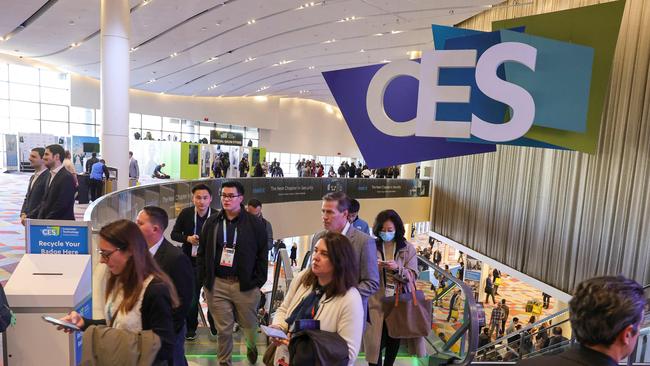 Attendees at CES 2024 in Las Vegas, Nevada. CES, the world's largest annual consumer technology trade show, runs through January 12 and features about 4000 exhibitors showing off their latest products and services to more than 130,000 attendees. (Photo by Ethan Miller / GETTY IMAGES NORTH AMERICA / Getty Images via AFP)