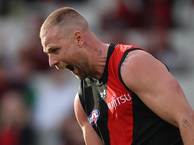 MELBOURNE, AUSTRALIA - AUGUST 04: Jake Stringer of the Bombers celebrates kicking a goal during the round 21 AFL match between Essendon Bombers and Fremantle Dockers at Melbourne Cricket Ground, on August 04, 2024, in Melbourne, Australia. (Photo by Daniel Pockett/Getty Images)