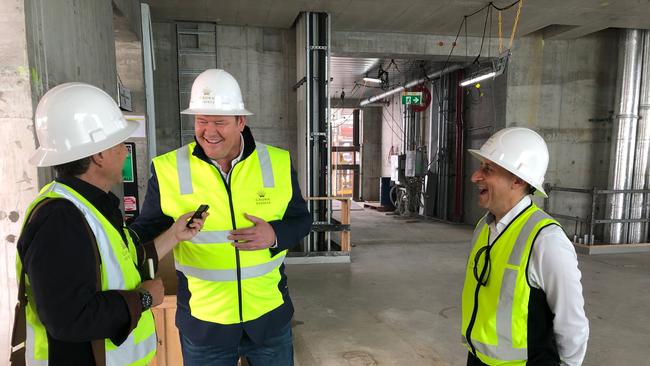 Higher spirits: James Packer tours Crown Resorts Barangaroo site in early 2020.