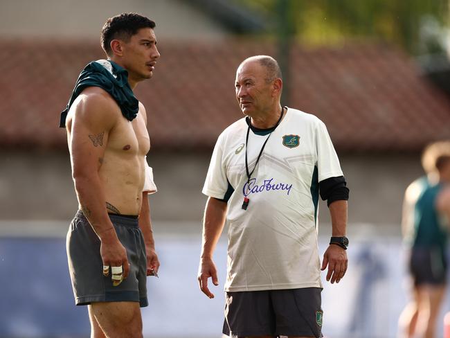 Eddie Jones and Lalakai Foketi talk during a Wallabies training session on Friday. Picture: Chris Hyde/Getty Images