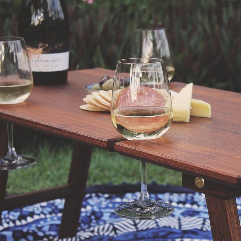 Di'Legno Design Co. has a range of wooden products produced with forest certified timber and finished with mineral oil and bee's wax including this Boho Wine Table featuring four wine holders. Order by May 4 in time for Mother's Day via dilegnodesignco.com Picture: Contributed