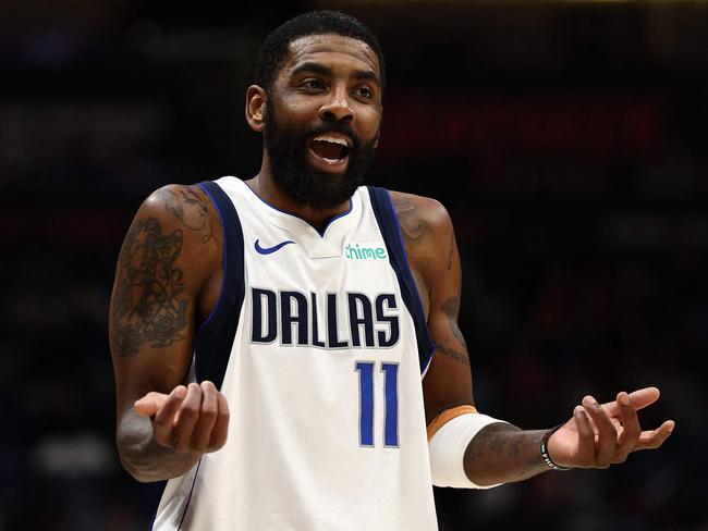 NEW ORLEANS, LOUISIANA - JANUARY 29: Kyrie Irving #11 of the Dallas Mavericks reacts during the game against the New Orleans Pelicans at Smoothie King Center on January 29, 2025 in New Orleans, Louisiana. NOTE TO USER: User expressly acknowledges and agrees that, by downloading and or using this photograph, User is consenting to the terms and conditions of the Getty Images License Agreement.   Chris Graythen/Getty Images/AFP (Photo by Chris Graythen / GETTY IMAGES NORTH AMERICA / Getty Images via AFP)