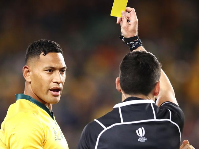 SYDNEY, AUSTRALIA - JUNE 23: Israel Folau of the Wallabies is shown a yellow card by referee Pascal Gauzere as Michael Hooper of the Wallabies watches on during the Third International Test match between the Australian Wallabies and Ireland at Allianz Stadium on June 23, 2018 in Sydney, Australia. (Photo by Mark Kolbe/Getty Images)