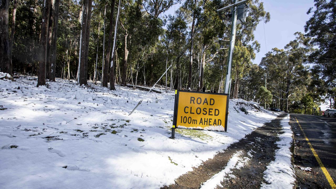 Snow down to around 200 metres around Hobart. Road to Kunanyi closed at Ferntree. Picture Eddie Safarik