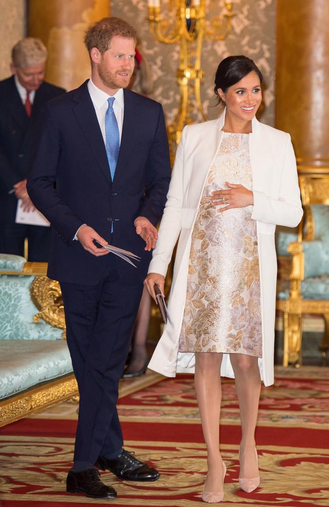 LONDON, ENGLAND - MARCH 5: Meghan, Duchess of Sussex and Prince Harry, Duke of Sussex attend a reception to mark the fiftieth anniversary of the investiture of the Prince of Wales at Buckingham Palace on March 5, 2019 in London, England. (Photo by Dominic Lipinski - WPA Pool/Getty Images)