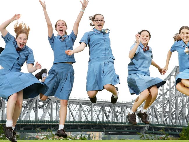 All Hallows students Josephine Daniel, Maddy Elgey, Rebecca Goodyear, Hannah Pham, and Samantha Ferrero, celebrate finishing their final exam of year 12, Brisbane. Photographer: Liam Kidston.