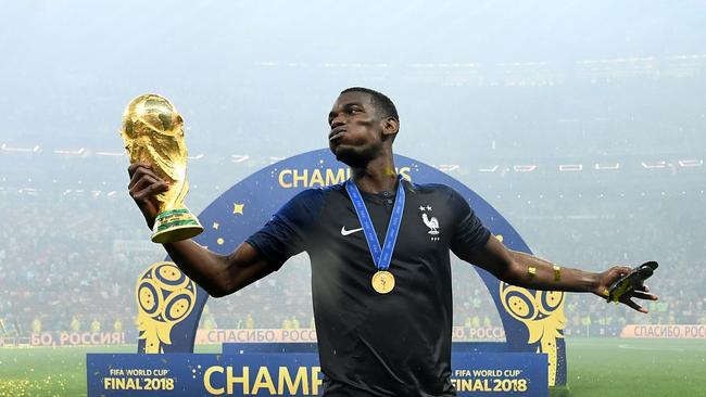 France's midfielder Paul Pogba celebrates with the World Cup trophy after the Russia 2018 World Cup final football match — a game which many viewers streamed live. Picture: AFP Photo / Franck Fife