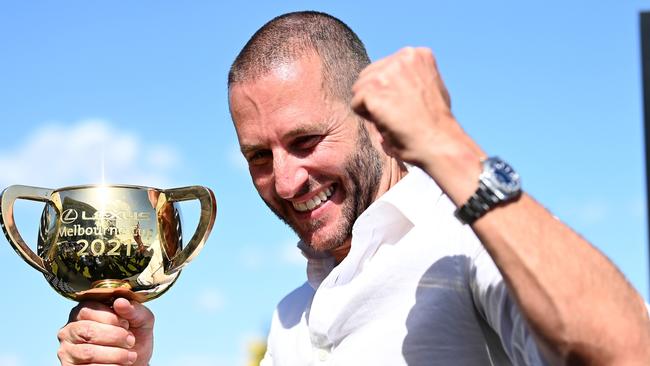 Brae Sokolski with the 2021 Melbourne Cup trophy after Verry Elleegant, who was earlier in her career trained by Darren Weir, stormed to Cup glory. Picture: Getty Images