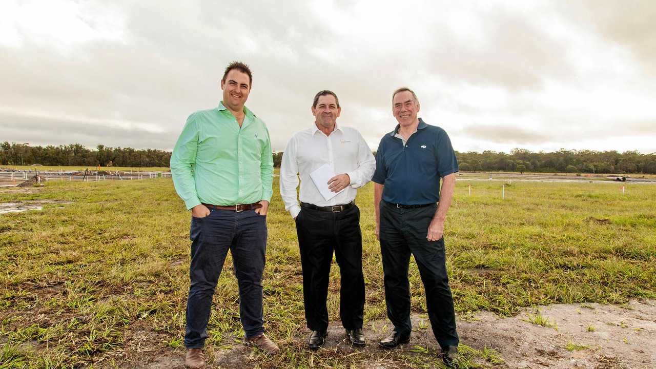 AVID Property Group development manager Anthony Demeris, Mike Nancarrow of Stylemaster Homes and first home owner at Harmony Daniel Clark on site. Picture: Photographer:Gary Mills