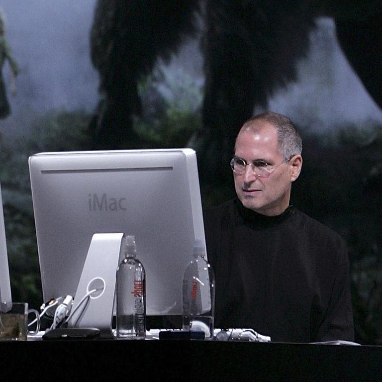 Apple co-founder Steve Jobs demonstrates the first Intel iMac during the 2006 Macworld expo. Picture: AFP / Justin Sullivan / Getty Images