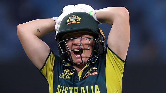 DUBAI, UNITED ARAB EMIRATES - OCTOBER 11: Alyssa Healy of Australia grimaces as she walks off after picking up an injury during the ICC Women's T20 World Cup 2024 match between Australia and Pakistan at Dubai International Stadium on October 11, 2024 in Dubai, United Arab Emirates. (Photo by Alex Davidson-ICC/ICC via Getty Images)