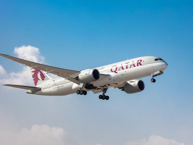 ESCAPEQatar Airways planePhoto - Qatar