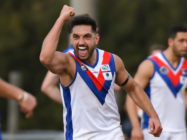 West Preston Lakeside midfielder Ozgur Uysal kicks the goal to seal his team's win over Macleod in the Northern Football League. Picture: Nathan McNeill.