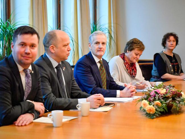 Norwegian Prime Minister Jonas Gahr Store (C) with ministers during a presentation of the government's plans of a multi-billion dollar aid package to Ukraine. Picture: NTB / AFP / Norway OUT