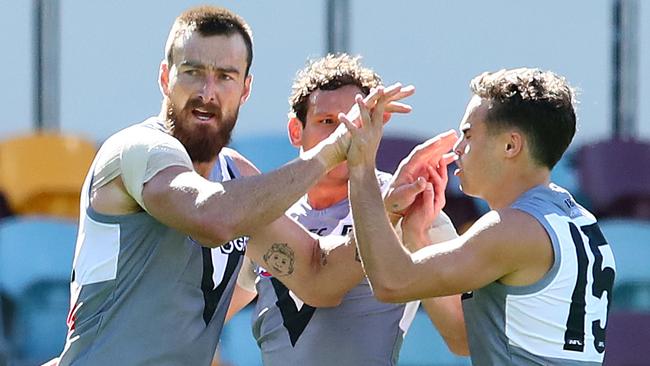 Charlie Dixon celebrates one of his three goals for Port Adelaide. Picture: Jono Searle/AFL Photos/via Getty Images