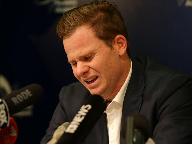 A distraught Steve Smith addresses the media at Sydney airport.