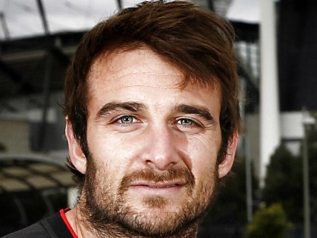 Essendon captain Jobe Watson and Melbourne skipper Nathan Jones with 19 year old cancer survivor Liam Evans before this weekends 10 year annversay of the Adam Ramanaskus cancer mach at the MCG. Pic: Michael Klein