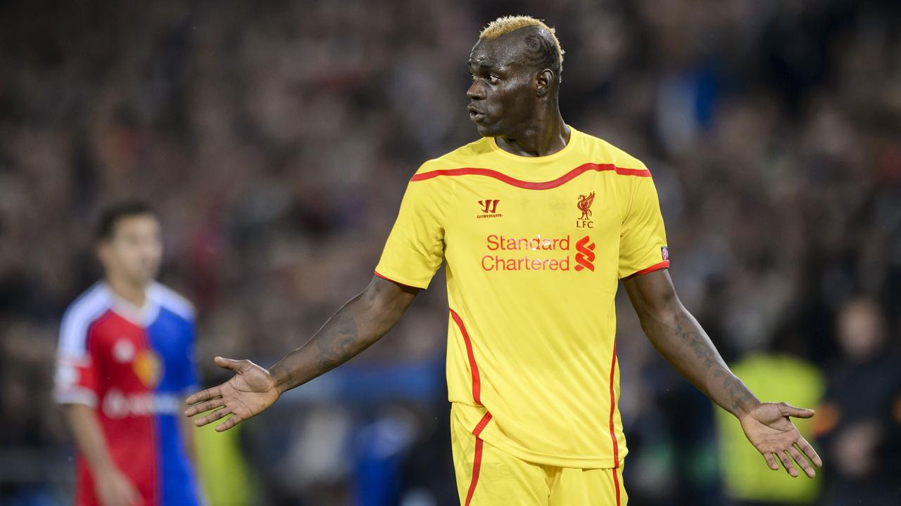 Liverpool's Italian forward Mario Balotelli reacts during the Champions League football match between FC Basel and FC Liverpool on October 1, 2014 at the St. Jakob-Park stadium in Basel. AFP PHOTO / FABRICE COFFRINI