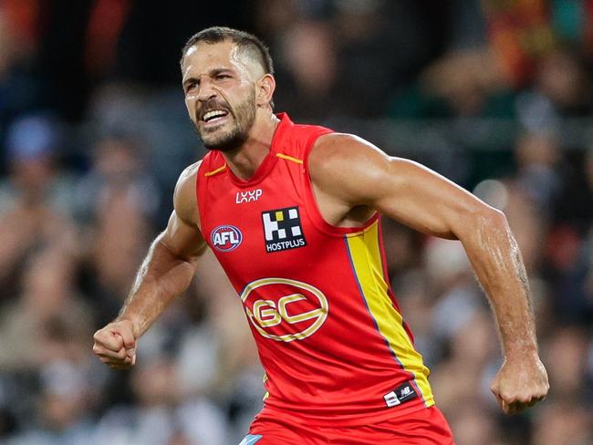 GOLD COAST, AUSTRALIA - JUNE 29: Ben Long of the Suns celebrates a goal during the 2024 AFL Round 16 match between the Gold Coast SUNS and the Collingwood Magpies at People First Stadium on June 29, 2024 in Gold Coast, Australia. (Photo by Russell Freeman/AFL Photos via Getty Images)