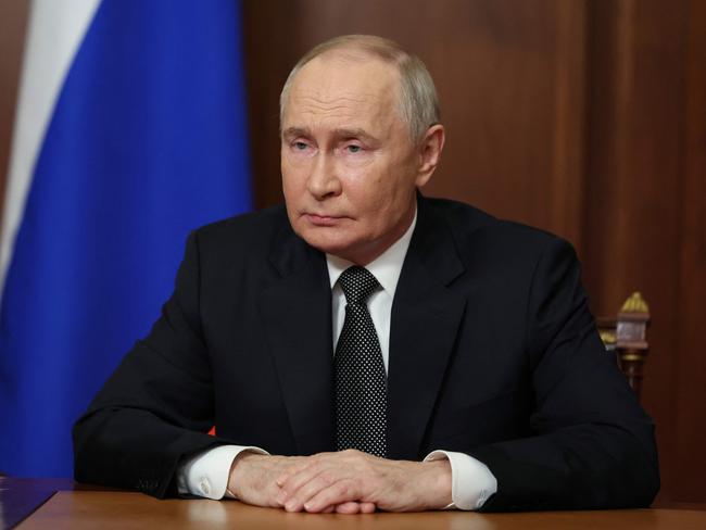 Russia's President Vladimir Putin delivers a televised address to the nation at the Kremlin in Moscow. Picture: AFP