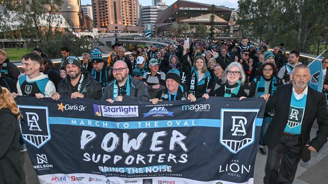 SEPTEMBER 13, 2024: Port Adelaide Army cross the footbridge to the Port v Hawthorn semi final at Adelaide Oval. Picture: Brenton Edwards