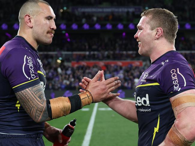 MELBOURNE, AUSTRALIA - SEPTEMBER 27:  Nelson Asofa-Solomona and Josh King of the Storm celebrate winning the NRL Preliminary Final match between the Melbourne Storm and Sydney Roosters at AAMI Park on September 27, 2024 in Melbourne, Australia. (Photo by Cameron Spencer/Getty Images)