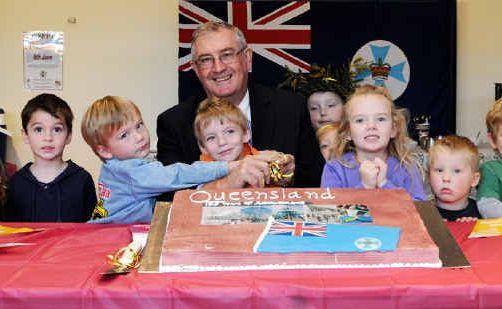 Cutting the cake with Mayor Ron Dyne were Sophia Mansfield, Amity Smith, Izabel Butterfield, Thomas Butterfield, Katelyn Davies, Noah Davies, Charlton Reeves, Khale Reeves, Koen Auer, Nellie Hextall, Lucas Keating, Lathan McMeeken, Tyler Lilwall-Murray, Lyla Birt and Samara Olsen. Picture: Contributed