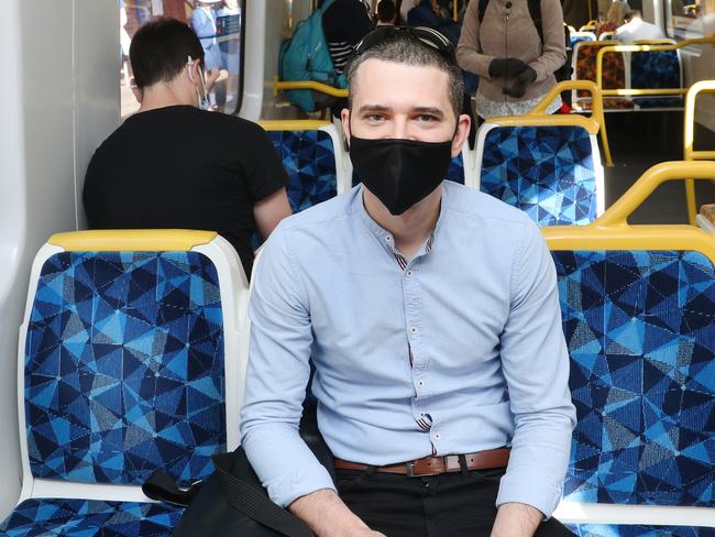 Kostya Kuzmenko catches a train in from the south east. 25% of office workers can return to work today after a COVID lockdown in Melbourne. Monday, November 30, 2020. Picture: David Crosling