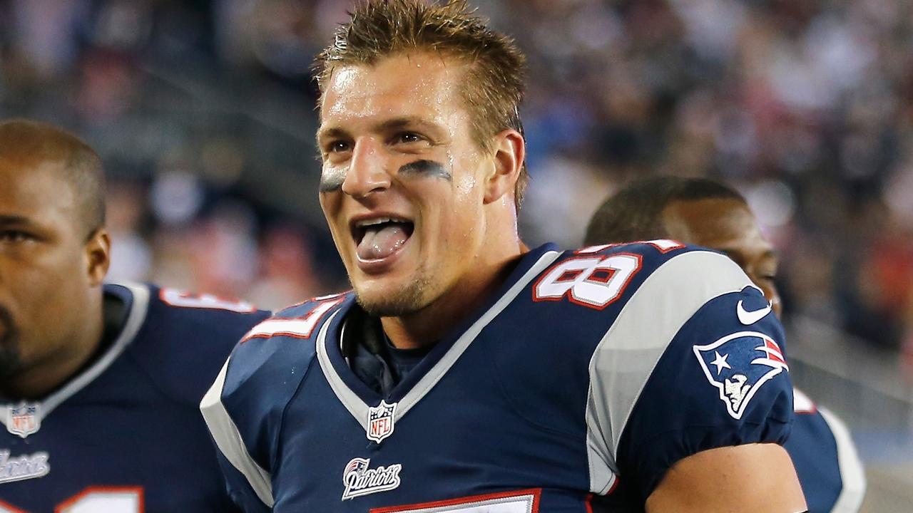 FOXBORO, MA - OCTOBER 05: Rob Gronkowski #87 of the New England Patriots reacts after scoring a touchdown during the third quarter against the Cincinatti Bengals at Gillette Stadium on October 5, 2014 in Foxboro, Massachusetts. Jim Rogash/Getty Images/AFP == FOR NEWSPAPERS, INTERNET, TELCOS & TELEVISION USE ONLY ==