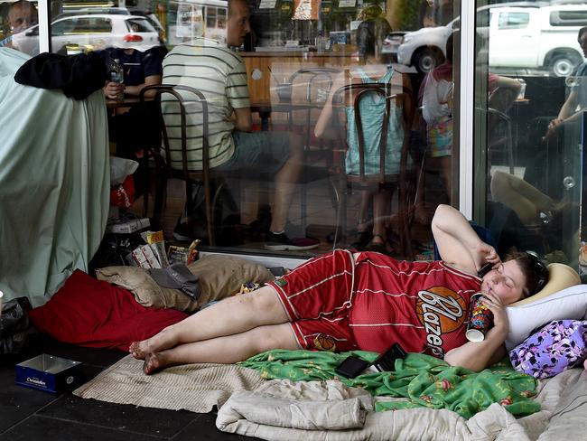 A homeless person on Collins St near Spencer St. Picture: Nicole Garmston