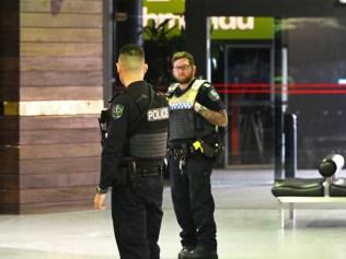 Armed police have swarmed the shopping centre at Marion. Picture: NewsWire / Brenton Edwards