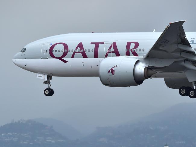 A Qatar Airways aircraft, flight 739 from Doha, comes in for a landing at Los Angeles International Airport on March 21, 2017 in Los Angeles, California.  From toothpaste to pocket knives, ink cartridges and scissors, the US cabin ban on electronic devices on flights from the Middle East and North Africa adds to a long list of products already blacklisted on international flights. / AFP PHOTO / FREDERIC J. BROWN