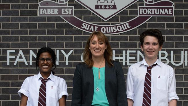 Fort St high students Barisha Tashnin and Daniel Holland with principal Juliette McMurray. AAP IMAGE / MONIQUE HARMER.