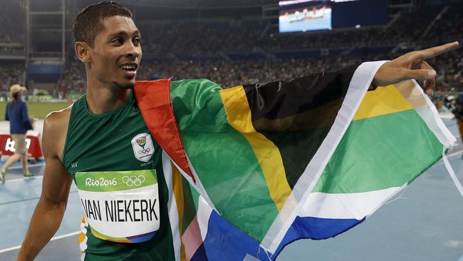 South Africa's Wayde van Niekerk celebrates winning the men's 400m in world record time.