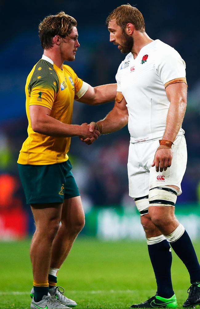 England’s Chris Robshaw congratulates Michael Hooper after the Wallabies win.