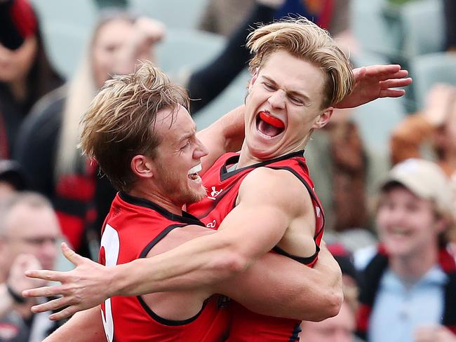 AFL - Sunday, 26th July, 2020 - Adelaide Crows v Essendon at the Adelaide Oval. Essendon's Ned Cahill celebrates his first goal with Essendon's Darcy Parish Picture: Sarah Reed