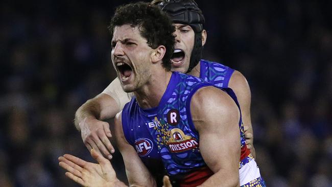 Tom Liberatore celebrates a final-quarter goal with Caleb Daniel. Picture: Colleen Petch